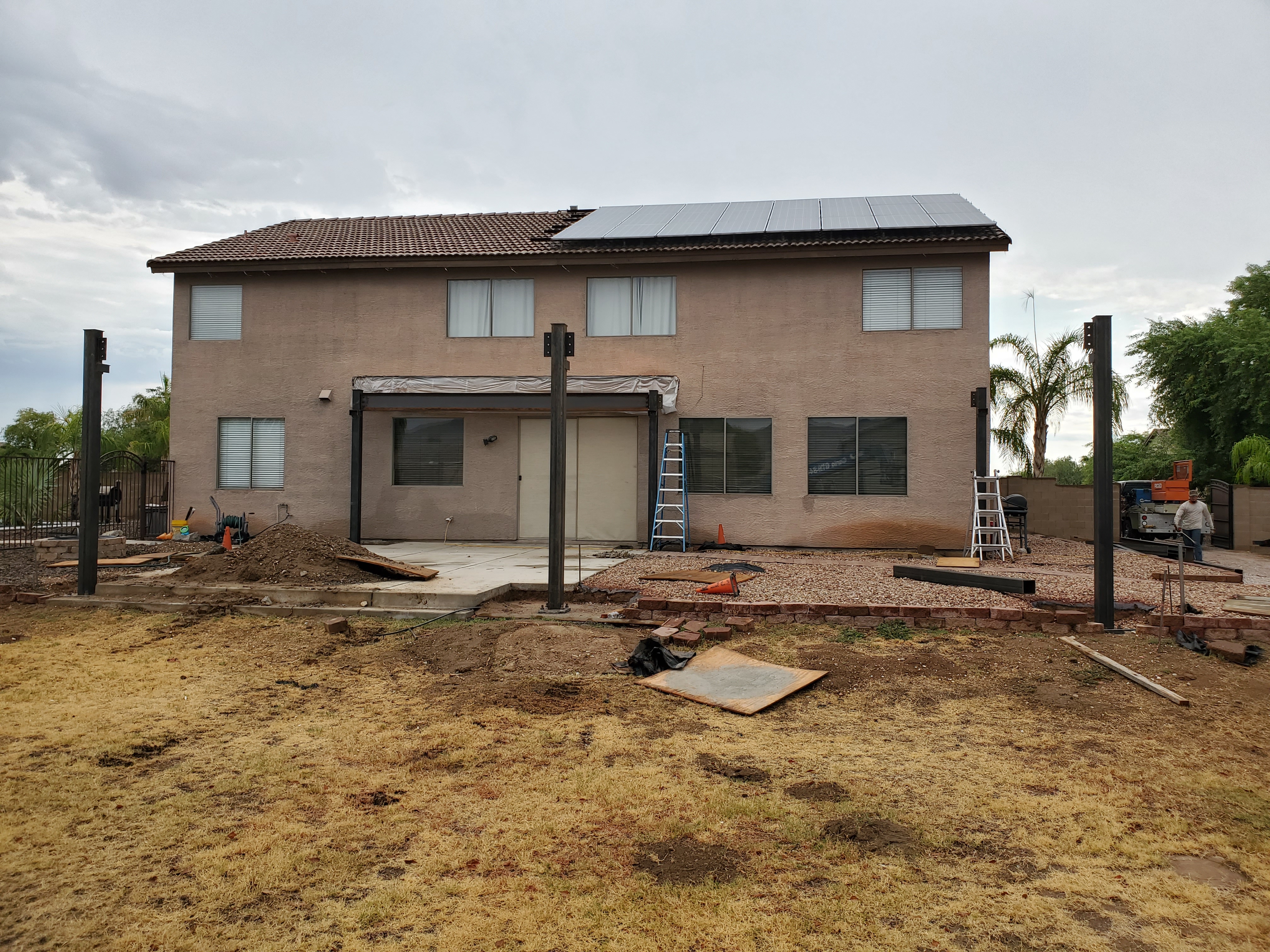 Exterior materials like pavers, stucco, and decking